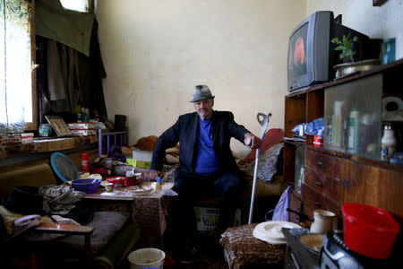 Bosnian Serb Teso Kuzmanovic, an internally displaced person from Gracanica, sits inside his home at a reception center Kladari Donji where IDPs live, near Modrica, Bosnia and Herzegovina, October 1, 2018. REUTERS/Dado Ruvic