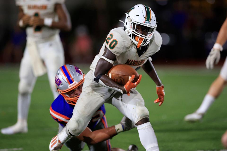 Mandarin's Tiant Wyche (20) is up to 1,462 rushing yards after Friday's Region 1-4M victory at Lake Mary.