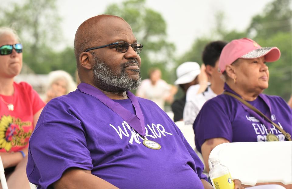Cancer survivor Robert C. Smith listens to a speaker at Saturday’s Relay for Life of Southern Bastrop County at Bastrop High School’s Erhard Field.