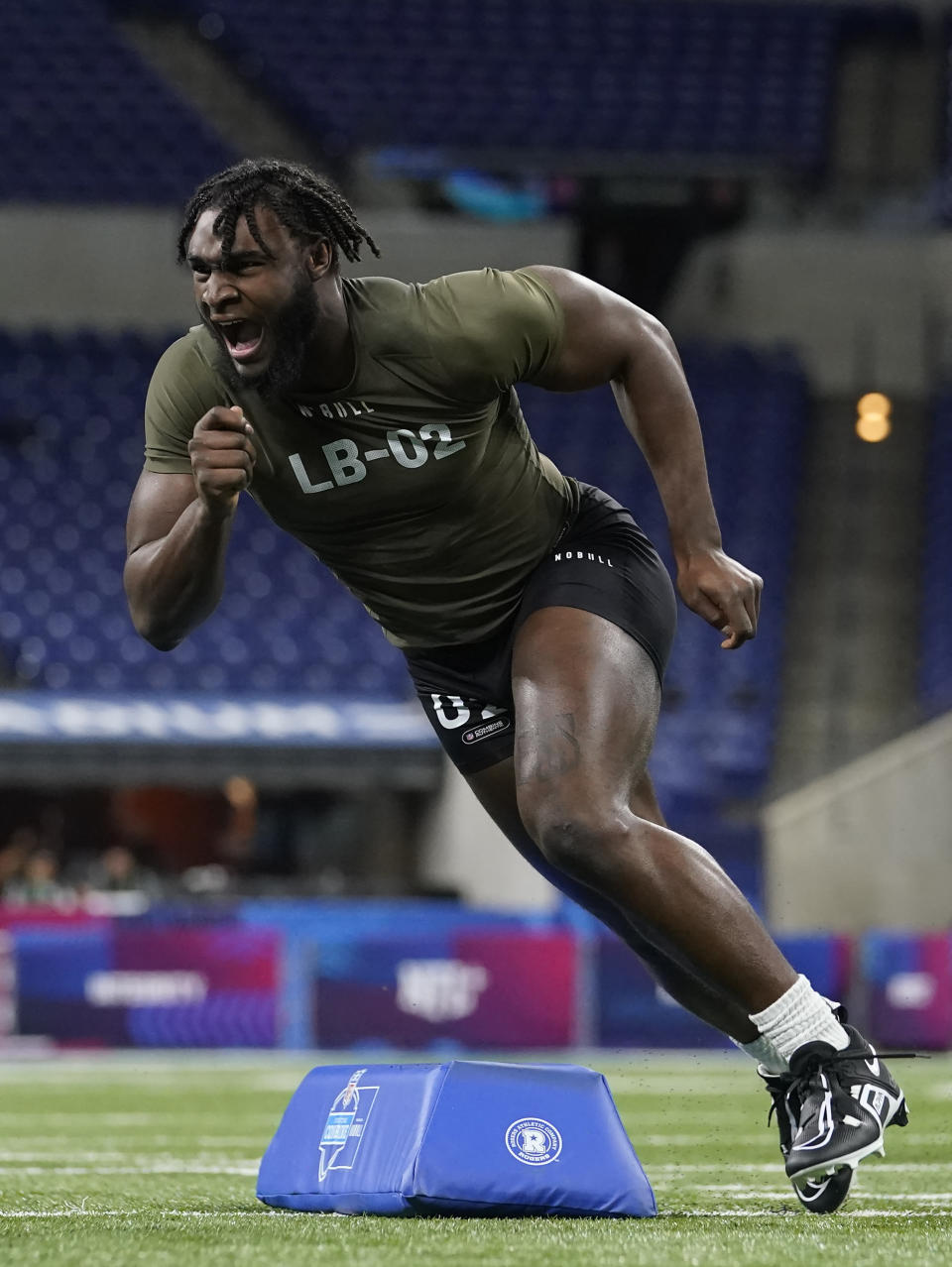 FILE - Alabama linebacker Will Anderson runs a drill at the NFL football scouting combine in Indianapolis, March 2, 2023. This draft class is deep at both edge rusher and corner, though the top tier at those two positions might be a little light on star prospects — outside of Anderson. (AP Photo/Michael Conroy, File)