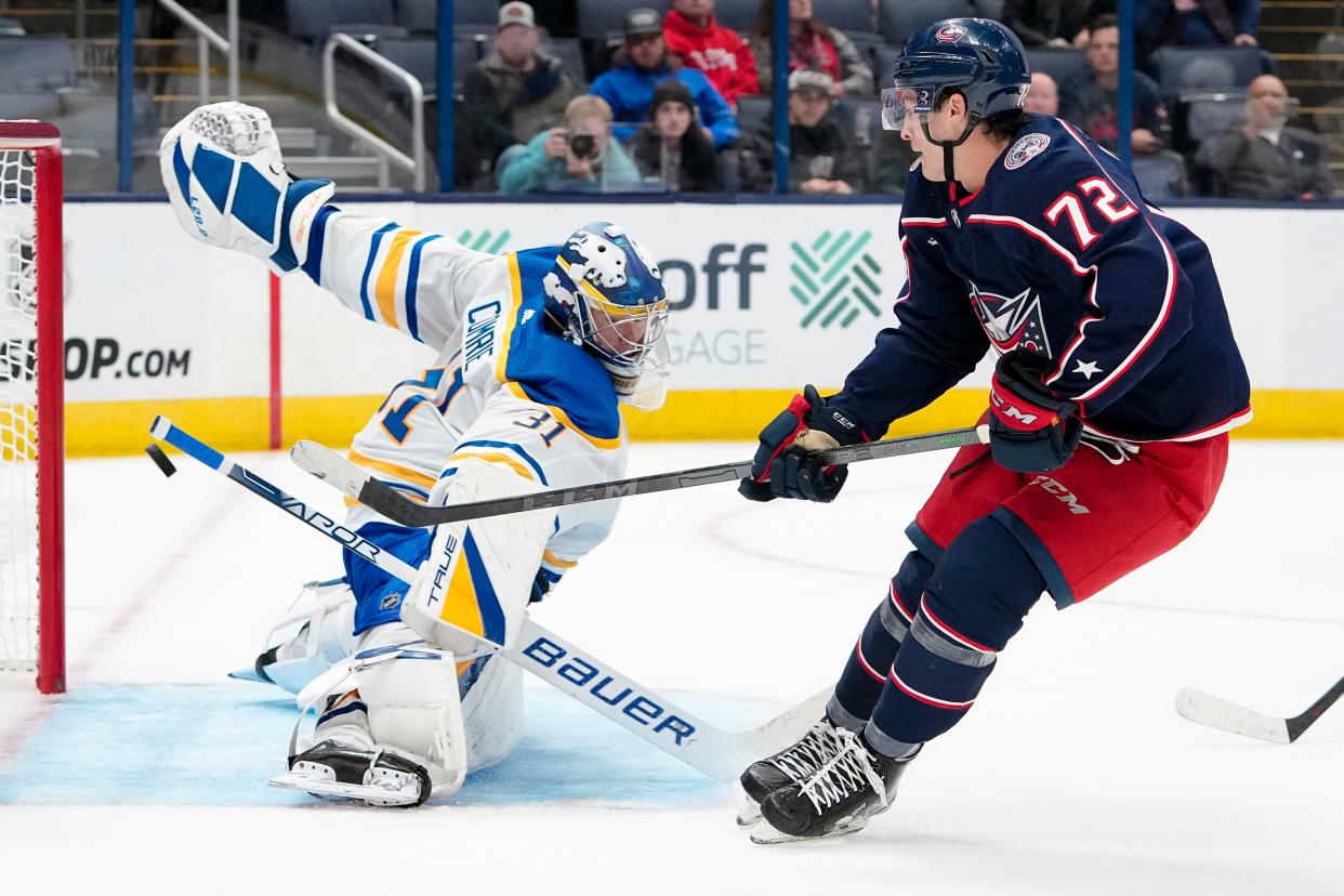 Blue Jackets forward Carson Meyer scores a goal past Buffalo goaltender Eric Comrie on Wednesday.