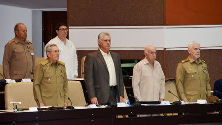 (Front L-R) Cuba's President Raul Castro, Cuba's First Vice-President Miguel Diaz-Canel, Cuba's Vice President and 2nd Secretary of Cuba's Communist Party Jose Ramon Machado Ventura, Commander of the Revolution Ramiro Valdes, (back L-R) General Leopoldo Cintra Frias and Cuba's Foreign Minister Bruno Rodriguez stand during the National Assembly in Havana, Cuba, December 21, 2017. Omara Garcia Mederos/ACN/Handout via REUTERS