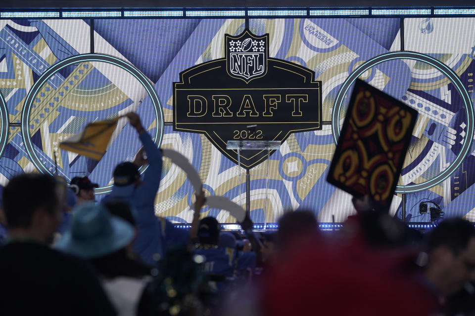 Fans cheer during the third round of the NFL football draft Friday, April 29, 2022, in Las Vegas. (AP Photo/Jae C. Hong)