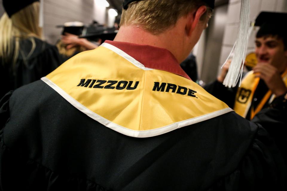 Graduates wait backstage before the University of Missouri College of Arts and Science graduation at Mizzou Arena on Saturday, May 12, 2018. [Hunter Dyke/Tribune]