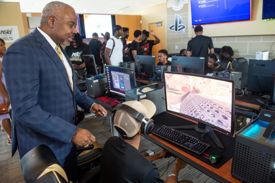 ASU President Quinton Ross talks with E-Sport students during the opening of the ASU Gaming and Esports Lab at the John Garrick Hardy Center at Alabama State University in Montgomery, Ala., on Wednesday, March 8, 2023.