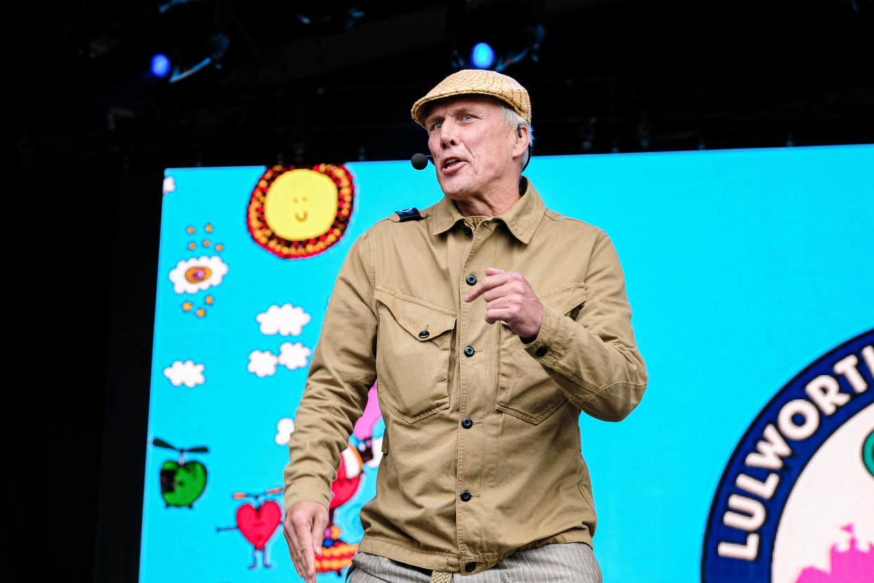 LULWORTH, DORSET, UNITED KINGDOM - 2021/07/30: English percussionist, dancer, DJ and media personality Mark Berry, aka Bez, most popularly known as being a member of British bands, The Happy Mondays and Black Grape, performs on stage at Camp Bestival in Lulworth. (Photo by Dawn Fletcher-Park/SOPA Images/LightRocket via Getty Images)