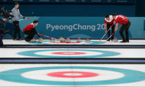 <p>Switzerland populate the head in end 9 at the Gangneung Curling Centre during day thirteen of the PyeongChang 2018 Winter Olympic Games in South Korea. PRESS ASSOCIATION Photo. Picture date: Thursday February 22, 2018. See PA story OLYMPICS Curling. (Getty) </p>