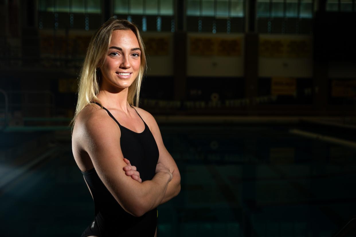 Zeeland's Sadie Huizenga poses for a portrait Wednesday, Nov. 23, 2022, at Zeeland West High School. Huizenga has been named The Sentinel's Diver of The Year.