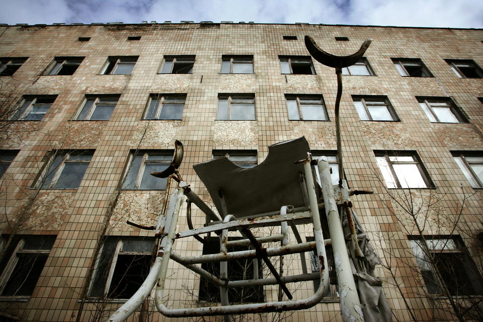 Medical equipment lies idle in front of a hospital in the abandoned town of Pripyat, in the 30 km (19 miles) exclusion zone around the closed Chernobyl nuclear power plant March 31, 2006. [Around 50,000 Pripyat residents were evacuated after the disaster, taking only few belongings. Ukraine is preparing to mark the 20th anniversary of the world's worst nuclear disaster, when a reactor at the Chernobyl plant exploded, spreading radioactivity across Europe and the Soviet Union.]