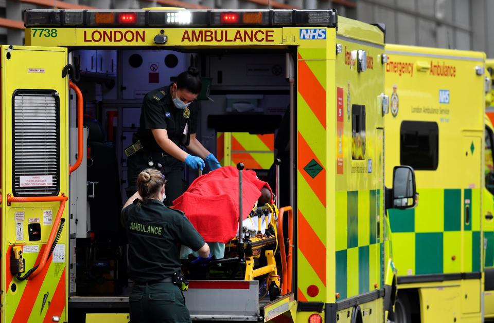 <p>The ambulance service has been stretched as covid infections soar.</p> (Reuters)