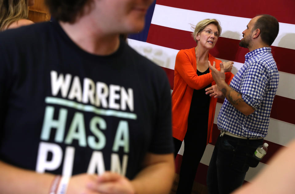 SIOUX CITY, IOWA - JULY 19: (L-R) O. Kay Henderson, news director for Radio Iowa and Kathie Obradovich, the opinion editor and columnist for the Des Moines Register, look on as democratic presidential hopeful U.S. Sen. Elizabeth Warren (D-MA) speaks during the AARP and The Des Moines Register Iowa Presidential Candidate Forum on July 19, 2019 in Sioux City, Iowa. Twenty democratic presidential hopefuls are participating in the AARP and Des Moines Register candidate forums that will feature four candidates per forum that are being to be held in cities across Iowa over five days. (Photo by Justin Sullivan/Getty Images)