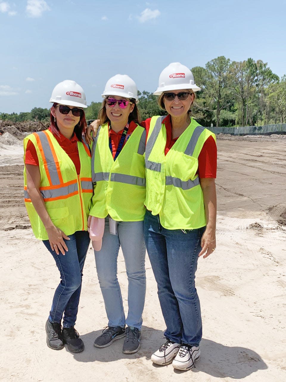 Dreamers Academy Registrar Erica Rivera, founder Geri Chaffee, and Dr. Cathy Rodriguez, Head of School at the site of the new campus.