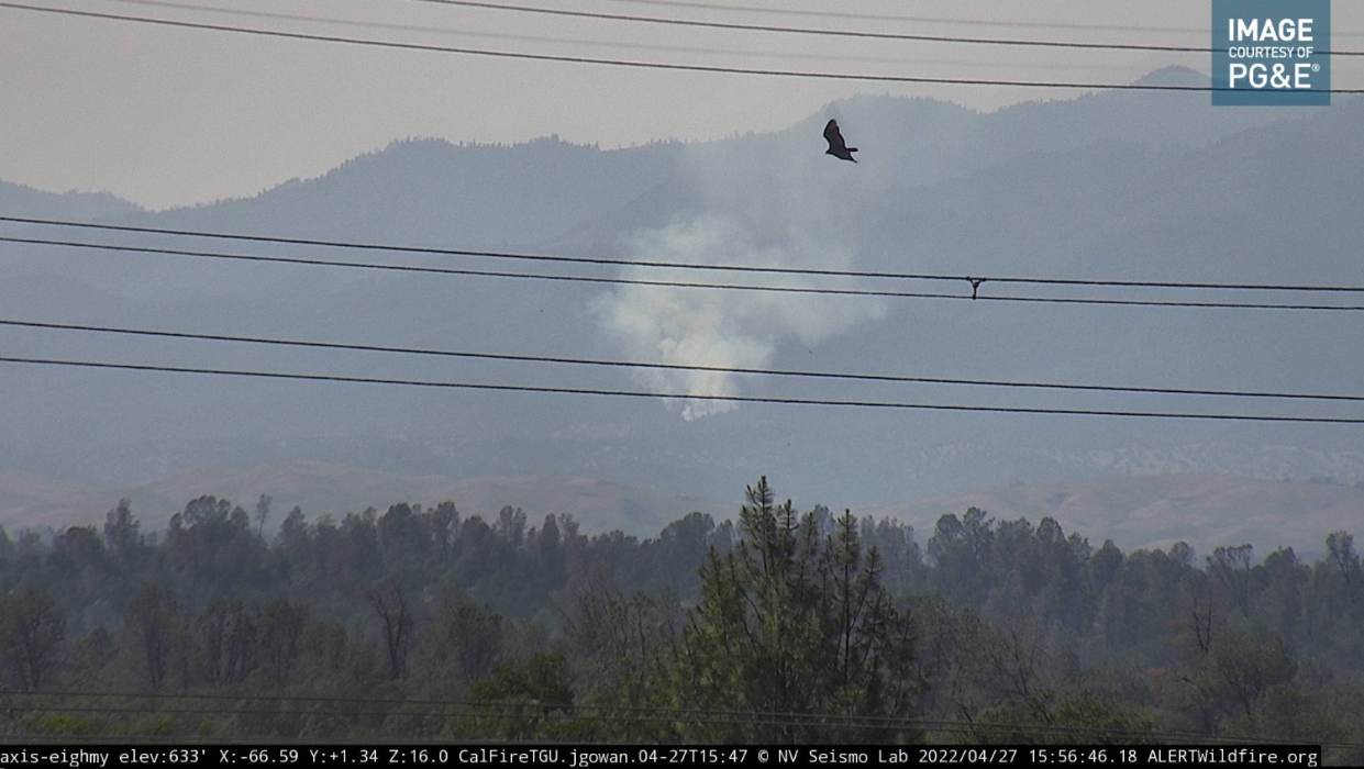 Smoke rises from a fire burning in the Platina area on Wednesday, April 27, 2022.