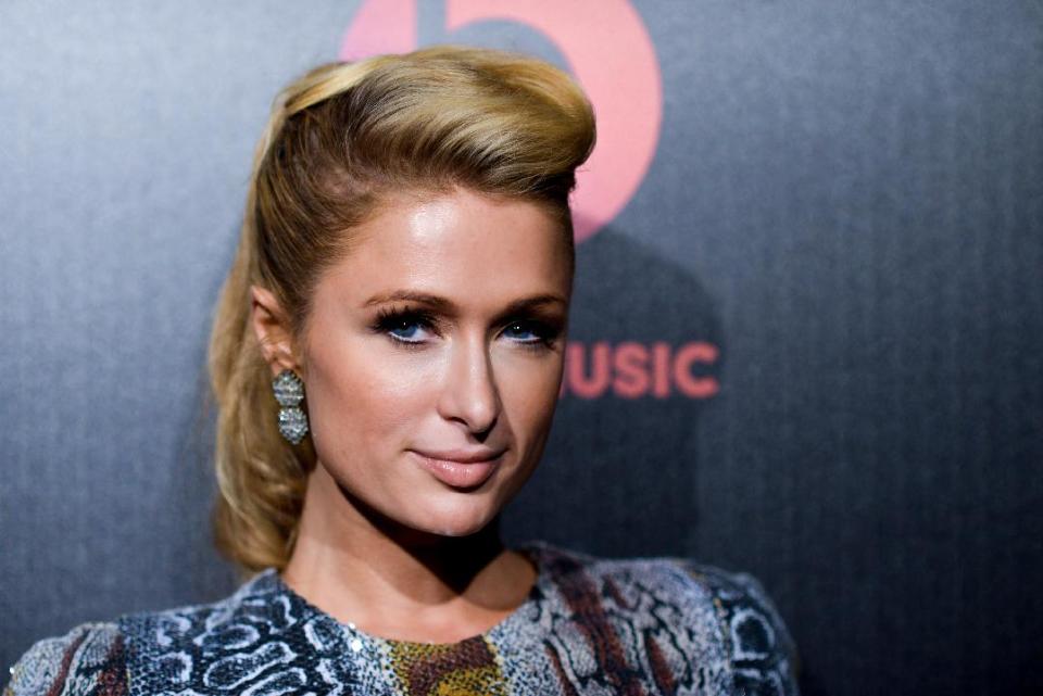 Paris Hilton arrives at Beats Music Launch Party at the Belasco Theatre, Friday, Jan. 24, 2014, in Los Angeles, Calif. (Photo by Richard Shotwell Invision/AP)