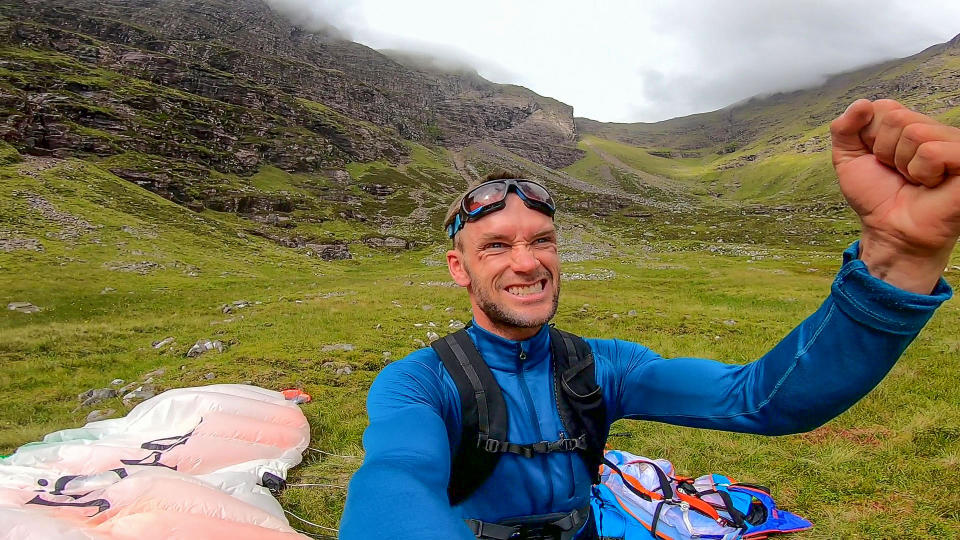 A brave base jumper has become the first person ever to fly a wingsuit from the top of a British mountain. Former Royal Marine Tim Howell, 31, leapt from the 4,000ft peak of An Teallach in the northwest Highlands in Scotland. He plunged down a steep gully for 30 seconds before deploying his parachute and landing safely on the banks of Loch Toll an Lochain.