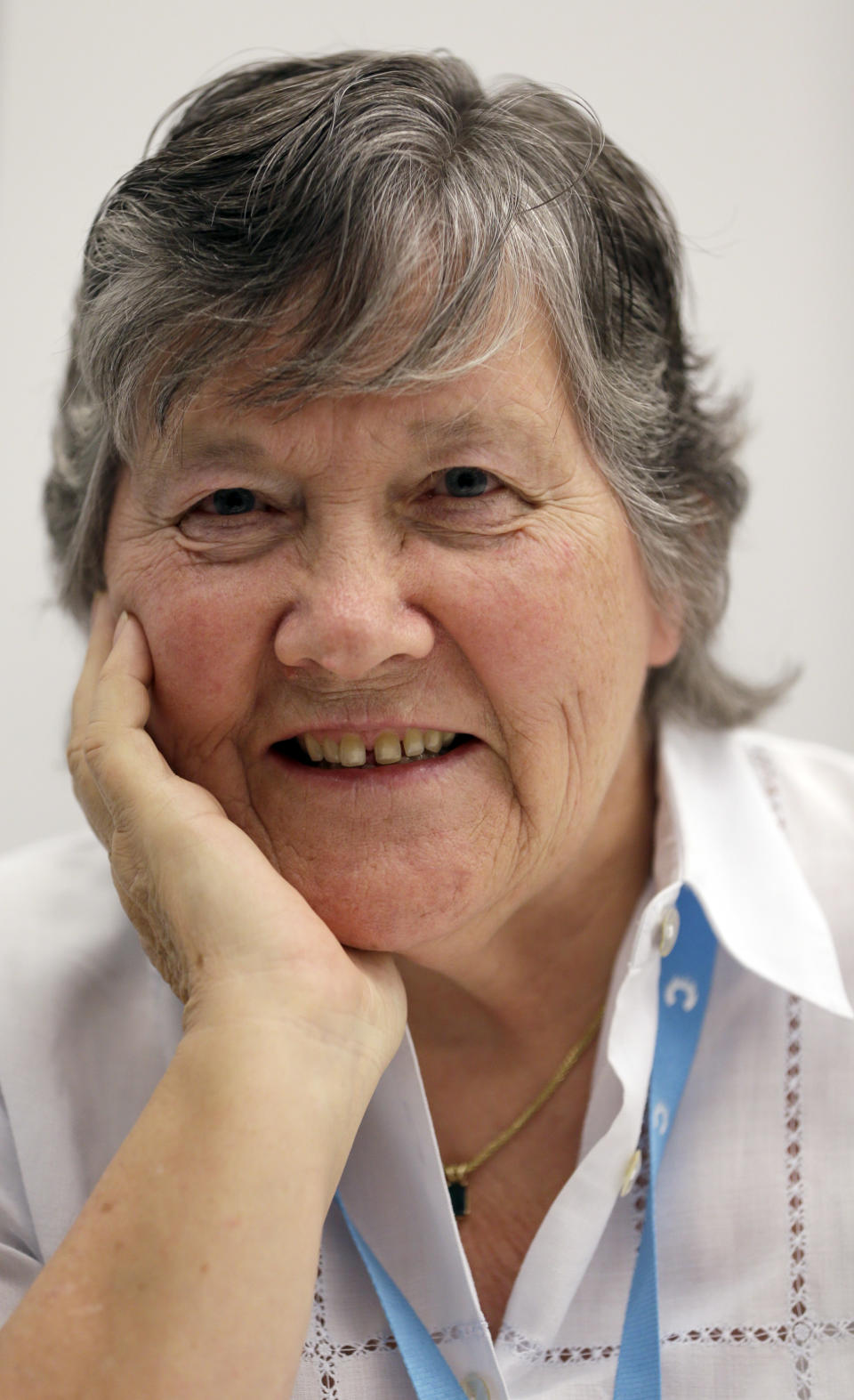 Maggie Wilcox, breast cancer survivor poses for a photograph at a news conference on breast cancer screening, in London, Monday, Oct. 29, 2012. In recent years, the British breast screening program has been slammed for focusing on the benefits of mammograms and downplaying the risks. Wilcox, a breast cancer survivor and member of the expert panel, said the current information on mammograms given to British women was inadequate. (AP Photo/Kirsty Wigglesworth)