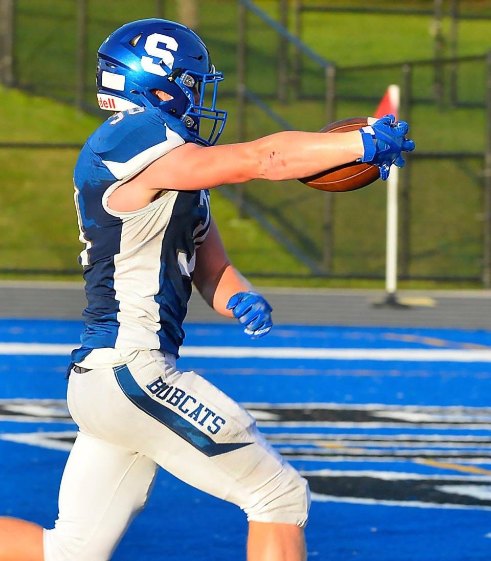 Seneca running back Ryan Miller scores a touchdown against Conneaut in Greene Township on Sept. 2.