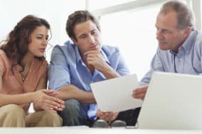 Couple going over paperwork