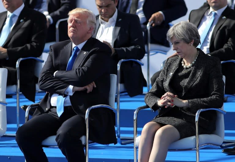 US President Donald Trump and British Prime Minister Theresa May at a NATO ceremony in Brussels