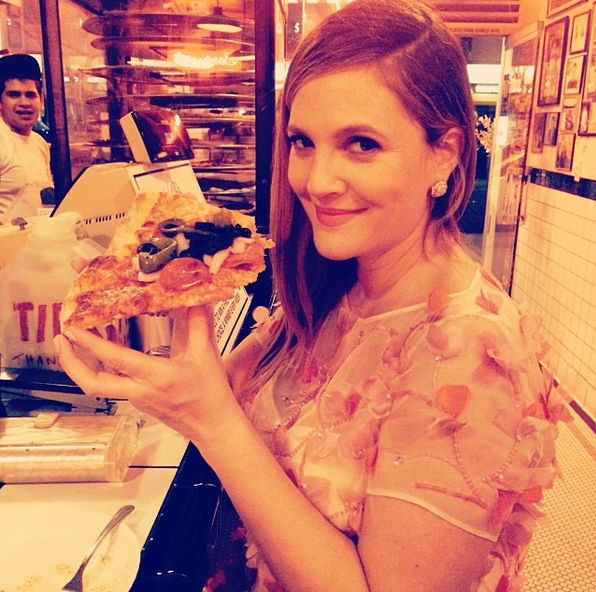 Drew Barrymore dug into some za at a Beverly Hills eatery following a 2014 awards show back when she was expecting her second daughter, Frankie. “Post Golden globes pregnant pizza after party !!!!! #waitedallnight #canteatfastenough #mulberrypizzarules” she shared. (Photo: Instagram)