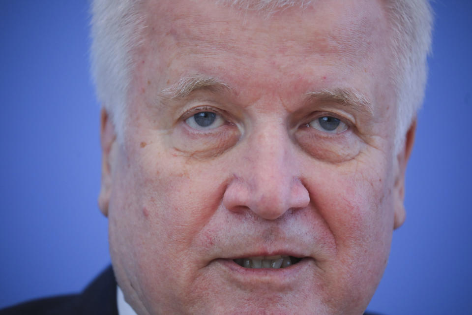 German Interior Minister Horst Seehofer gives a news conference with details of planned border openings, amid the spread of the coronavirus disease (COVID-19) in Berlin, Germany, May 13, 2020. (Hannibal Hanschke/Reuters via AP)