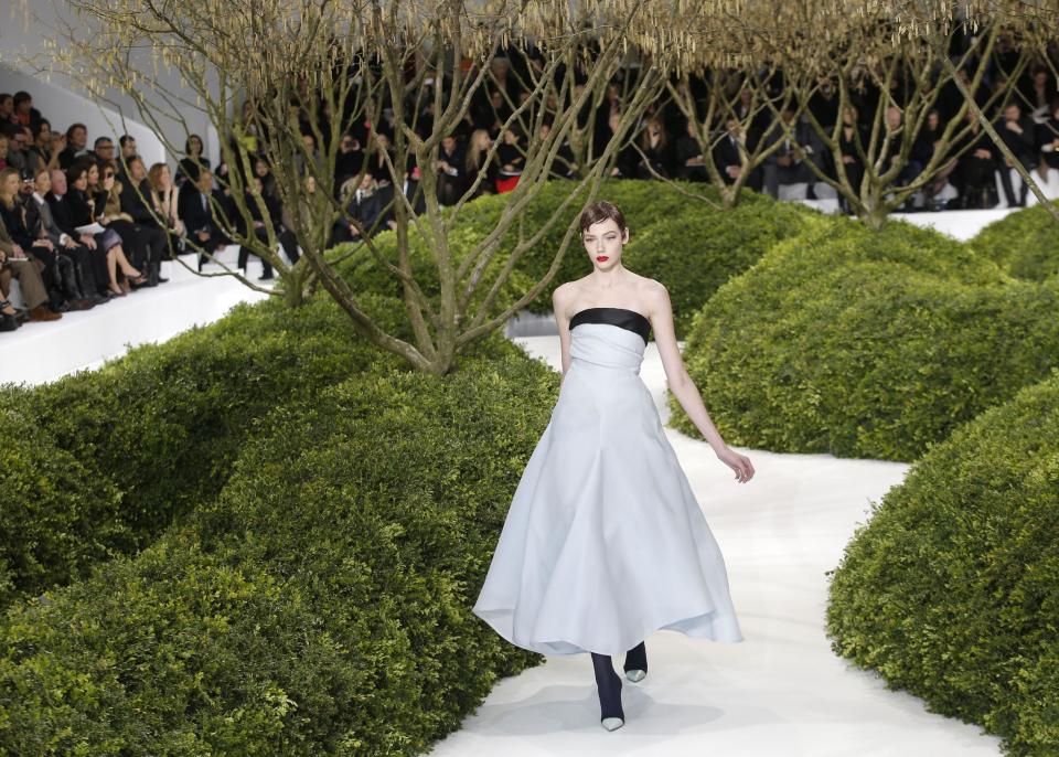 A model presents a creation by Raf Simons for Christian Dior's Spring Summer 2013 Haute Couture fashion collection, presented in Paris, Monday, Jan.21, 2013. (AP Photo/Christophe Ena)