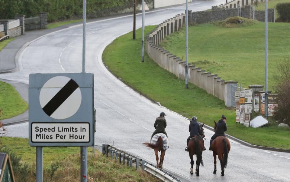 A group of horse riders crosses the border from the Republic of Ireland in Northern Ireland at Carrickcarnan in Co Louth (Niall Carson/PA) (PA Archive)