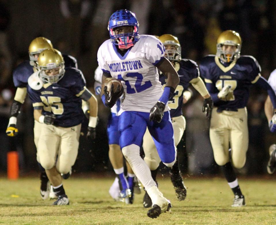 Middletown's Chris Godwin takes off against Salesianum in a November 2013 game. Middletown lost the game 24-13.