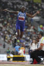 Brittney Reese, of the United States, competes in the women's long jump qualification at the World Athletics Championships in Doha, Qatar, Saturday, Oct. 5, 2019. (AP Photo/Hassan Ammar)