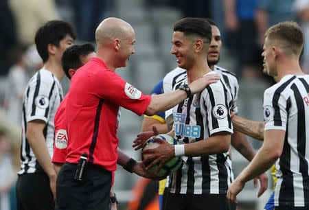 Soccer Football - Premier League - Newcastle United v Southampton - St James' Park, Newcastle, Britain - April 20, 2019 Newcastle United's Ayoze Perez celebrates after the match with the match ball with referee Anthony Taylor REUTERS/Scott Heppell