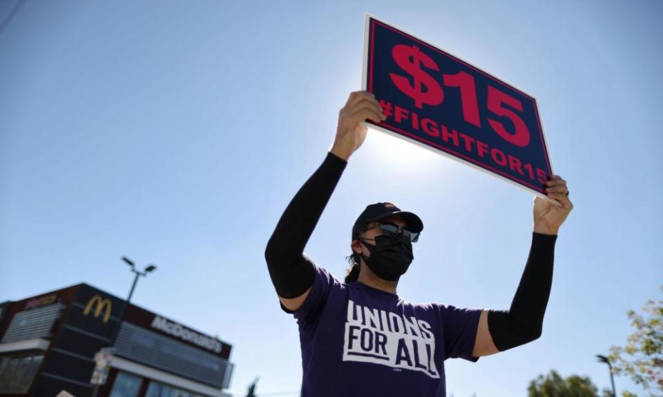 Fast-food workers and supporters rally in Los Angeles on 18 February.