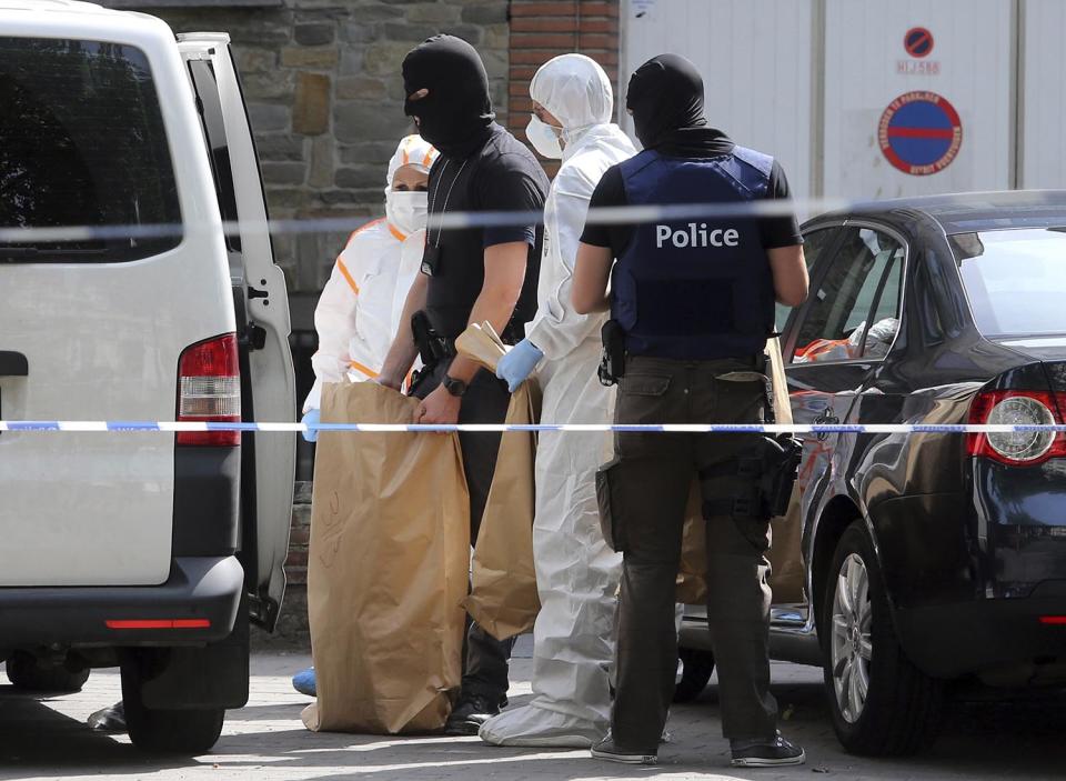 <p>Police and forensic officers work during a house search in the Molenbeek district of Brussels on Wednesday, June 21, 2017. Belgian authorities said they foiled a “terror attack” when soldiers shot a suspect in the heart of Brussels after a small explosion at a busy train station Tuesday on a night that continued a week of attacks in the capitals of Europe. (Francois Walschaerts/AP) </p>