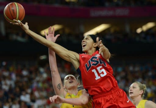 Australian centre Lauren Jackson (L) vies for the ball with US forward Candace Parker during the London 2012 Olympic Games women's semifinal basketball match bewteen Australia and the US at the North Greenwich Arena in London. Facing a major threat to their Olympic women's basketball dynasty, the United States shut down 2.03m centre Liz Cambage in the second half and beat Australia 86-73