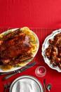 <p>With a roast goose this beautiful, your family and friend will still be sighing well into the new year thanks to this tastes-as-good-as-it-looks Christmas <a href="https://www.womansday.com/home/decorating/g1015/christmas-table-decoration-ideas/" rel="nofollow noopener" target="_blank" data-ylk="slk:dinner centerpiece;elm:context_link;itc:0;sec:content-canvas" class="link ">dinner centerpiece</a>.</p><p><a href="https://www.womansday.com/food-recipes/food-drinks/recipes/a12918/orange-rosemary-roast-goose-recipe-wdy1214/" rel="nofollow noopener" target="_blank" data-ylk="slk:Get the Orange-Rosemary Roast Goose recipe.;elm:context_link;itc:0;sec:content-canvas" class="link "><em><strong>Get the Orange-Rosemary Roast Goose recipe.</strong></em></a> </p>