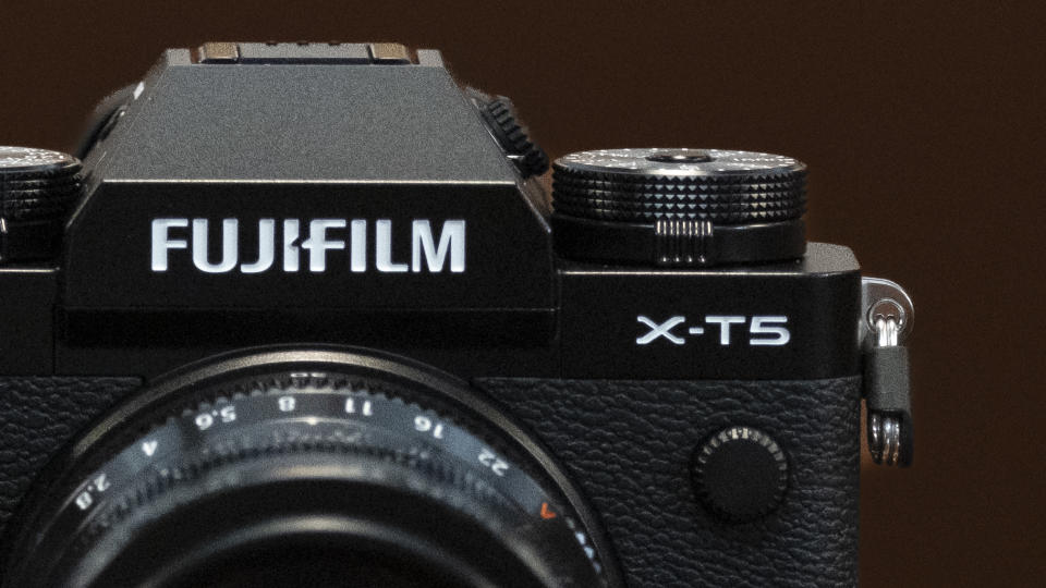 The Fujifilm X-T5 camera sitting on a table