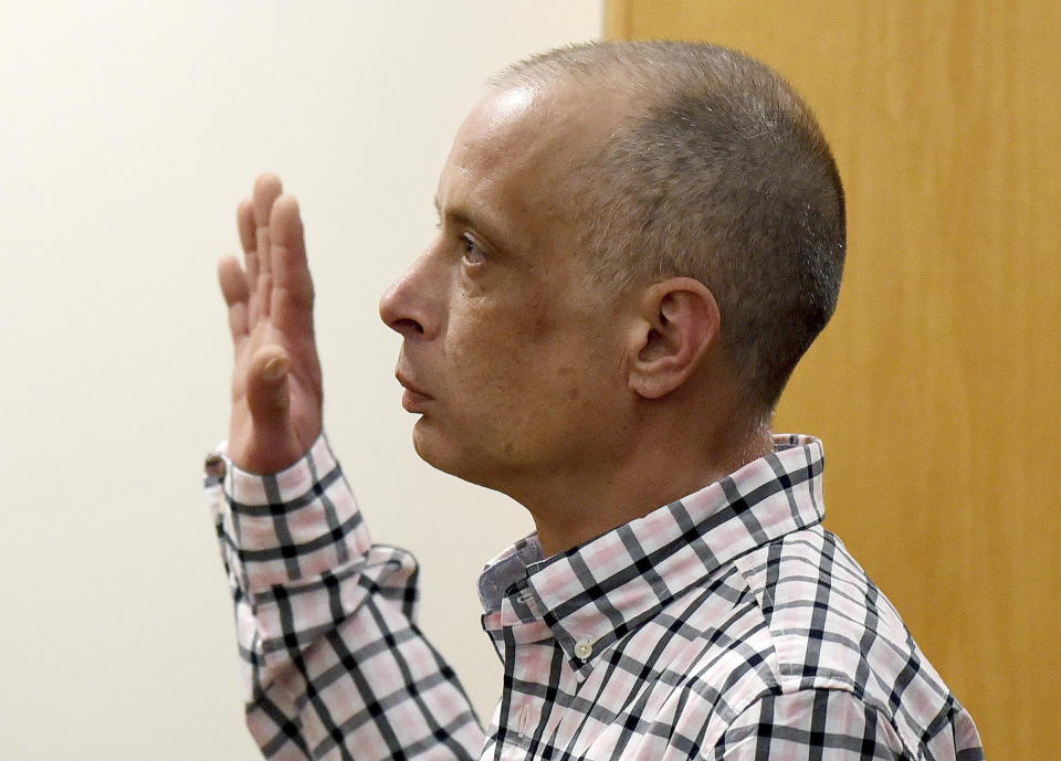 Youth Development Center plaintiff David Meehan gets sworn in before giving testimony in his civil trial at Rockingham County Superior Court in Brentwood, N.H. on Wednesday, April 17, 2024. (David Lane/Union Leader via AP, Pool)