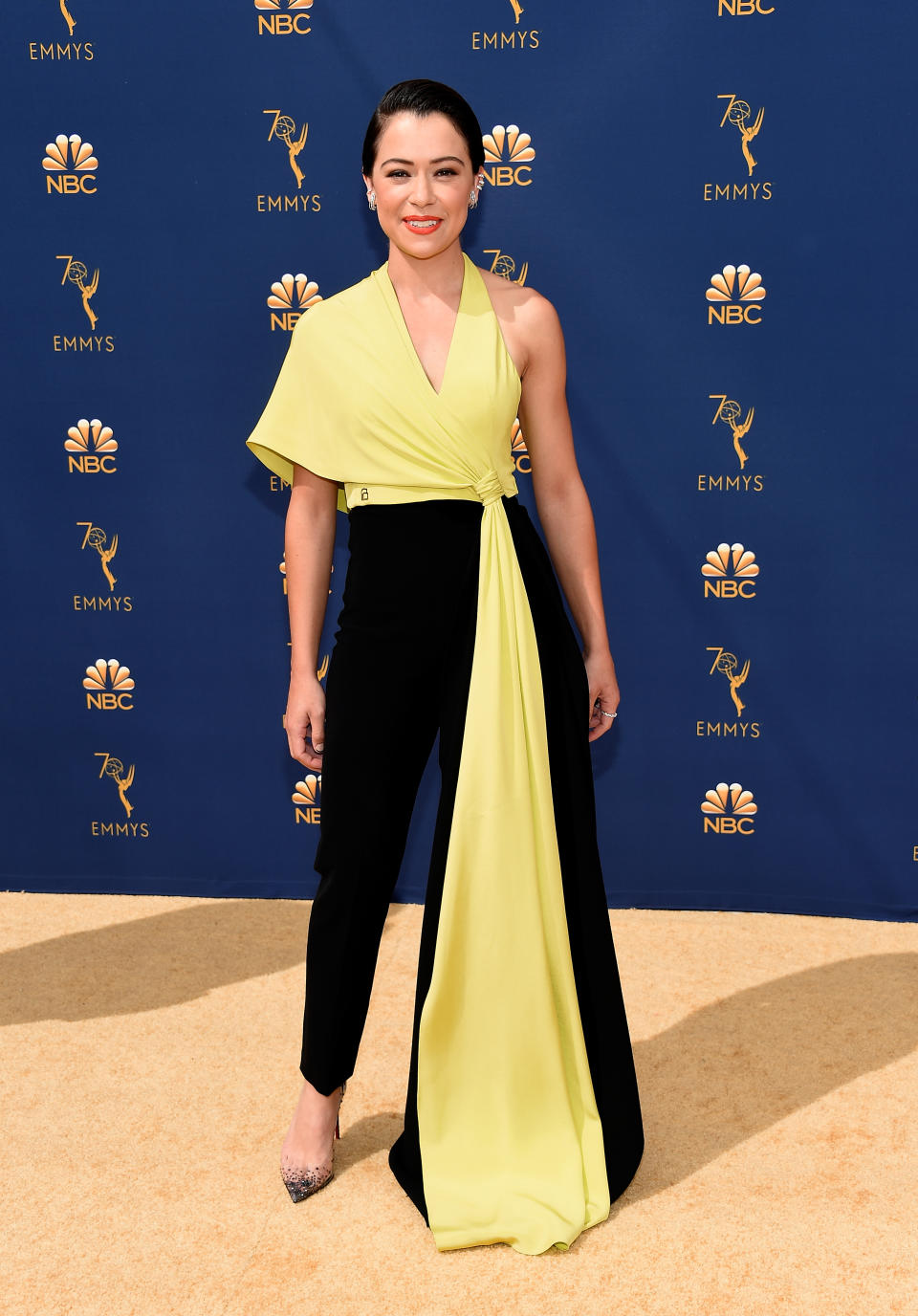 <p>Die Orphan Black-Schauspielerin hatte einen glänzenden Auftritt in einem zweifarbigen Jumpsuit von Christian Siriano. (Foto: Getty Images) </p>