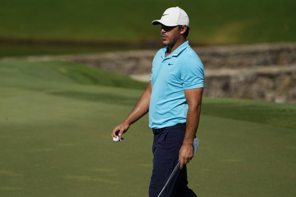 Brooks Koepka walks on the on the 15th green during the second round of the Wyndham Championship golf tournament at Sedgefield Country Club on Friday, Aug. 14, 2020, in Greensboro, N.C. (AP Photo/Chris Carlson)
