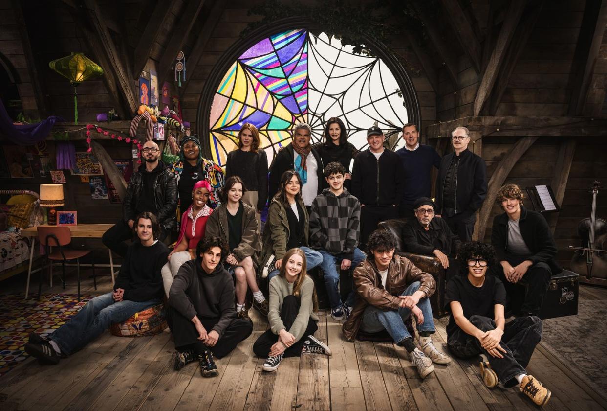 wednesday l to r georgie farmer, victor dorobantu, luyanda unati lewis nayo, joy sunday, owen painter, emma myers, billie piper, jenna ortega, evie templeton, luis guzmaacute n, isaac ordonez, catherine zeta jones, alfred gough, noah taylor, miles millar, tim burton, steve buscemi, moosa mostafa, hunter doohan on the set of wednesday season 2 cr helen sloannetflixcopy 2024