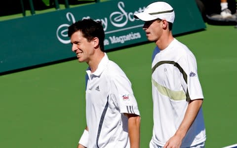 Murray and Henman play doubles at the Pacific Life Open in Indian Wells...Britain's Tim Henman (L) and compatriot Andy Murray play doubles together at the Pacific Life Open tennis tournament in Indian Wells, California March 13, 2007 - Credit: Reuters