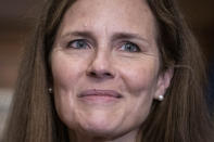 Judge Amy Coney Barrett, President Donald Trumps nominee for the U.S. Supreme Court, meets with Sen. Shelley Moore Capito, R-W.Va., not shown, on Capitol Hill in Washington, Wednesday, Sept. 30, . (Sarah Silbiger/Pool via AP)