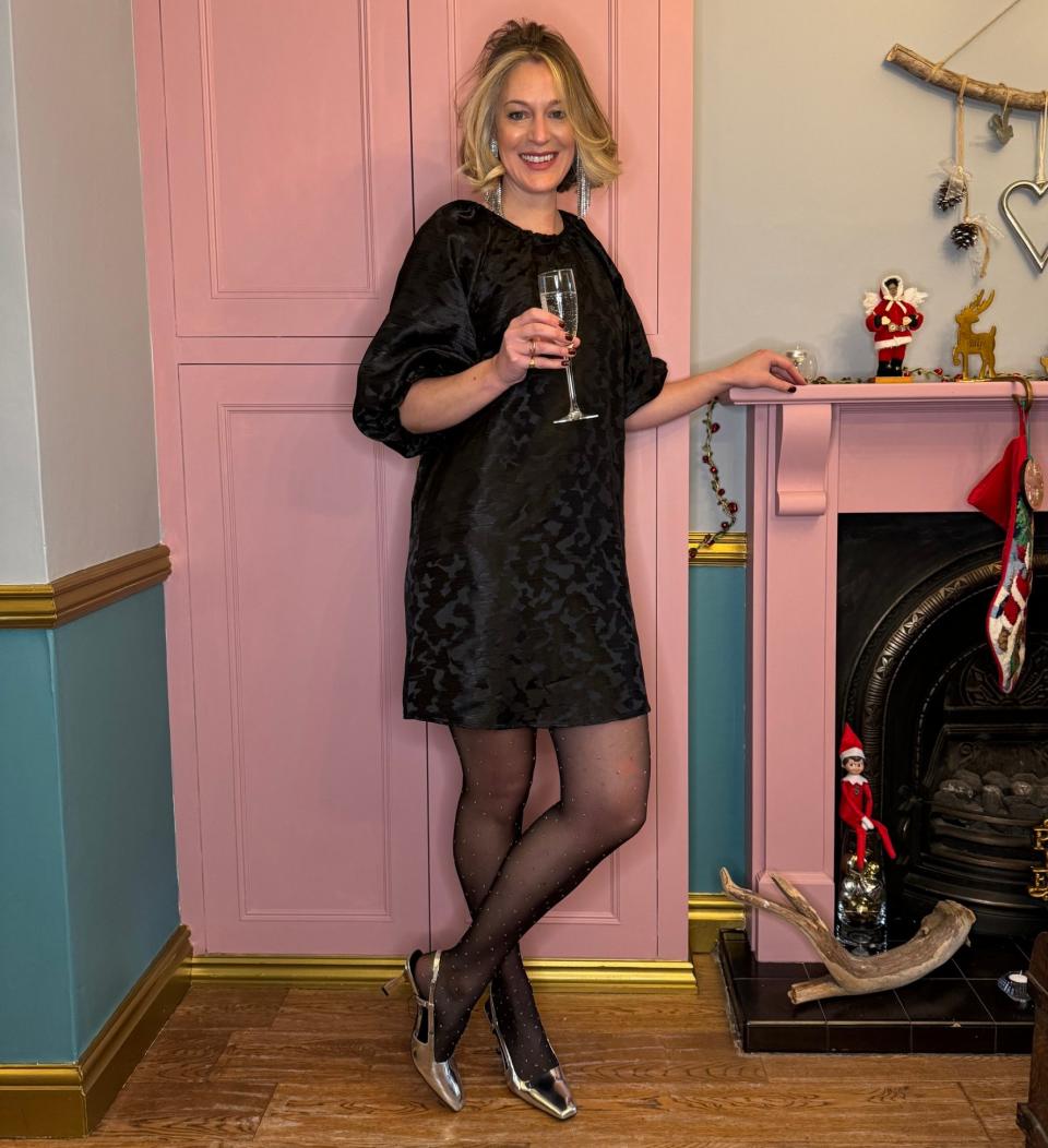 Lucy Denyer wearing the viral Marks and Spencer dress with a pair of silver slingbacks