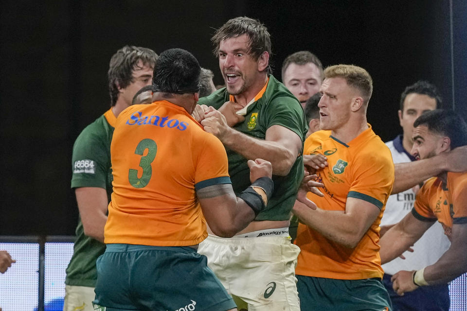 South Africa's Eben Etzebeth and Australia's Allan Alaalatoa, left, scuffle during the second Rugby Championship test match between the Wallabies and the Springboks in Sydney, Australia, Saturday, Sept. 3, 2022. (AP Photo/Mark Baker)