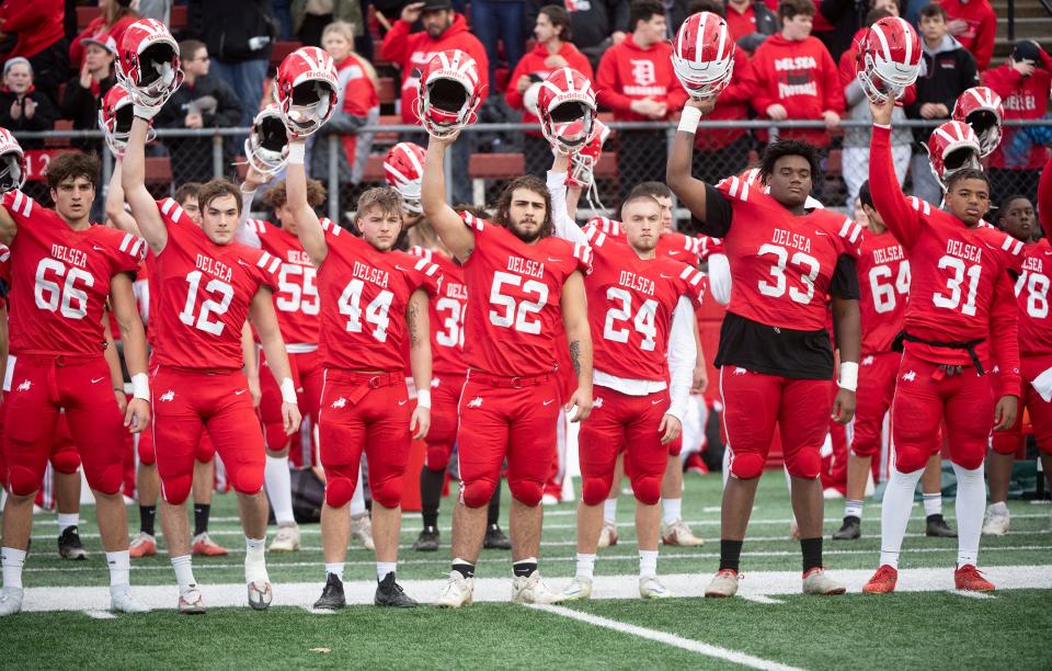 Members of the Delsea football team stand together prior to the NJSIAA State Group 3 football championship game between Delsea and Old Tappan played at Rutgers' SHI Stadium in Piscataway on Saturday, December 3, 2022.  