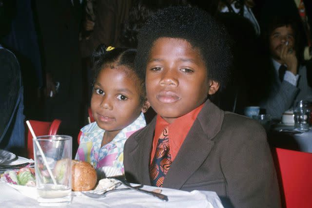 <p>Michael Ochs Archives/Getty</p> Janet Jackson with brother Randy circa 1971