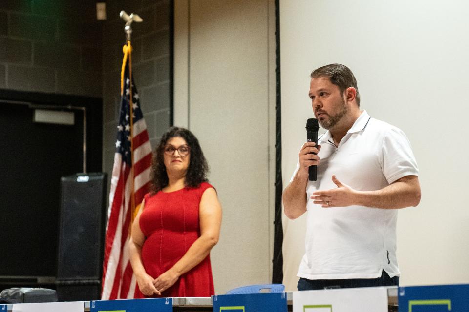 Phoenix Councilmember Betty Guardado, left, and Rep. Ruben Gallego, right, attend a town hall meeting for Gallego’s campaign for U.S. Senate at the Maryvale Community Center in Phoenix on October 14, 2023.