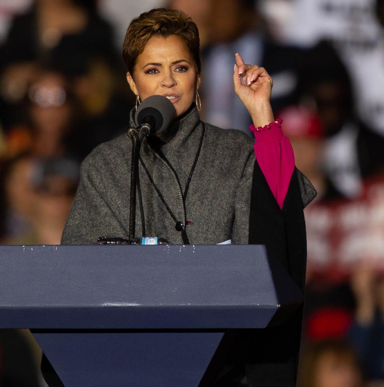 Kari Lake delivers a speech before former President Donald Trump's speech in Florence on Saturday, Jan. 15, 2022.