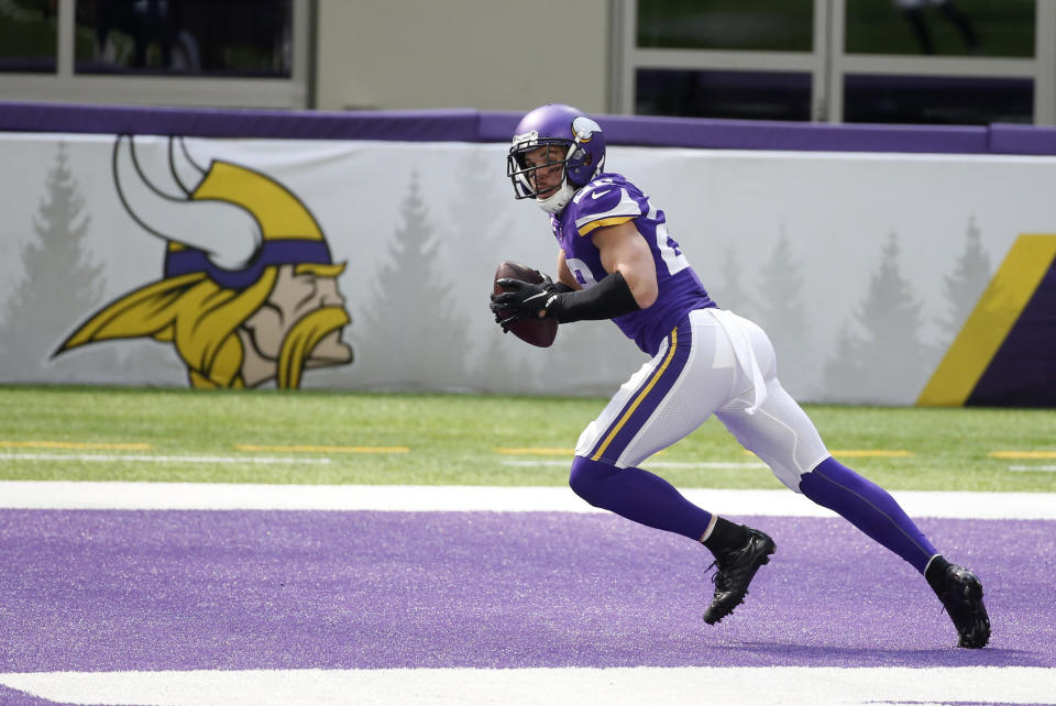 Minnesota Vikings strong safety Harrison Smith intercepts a pass in the end zone during the first half of an NFL football game against the Tennessee Titans, Sunday, Sept. 27, 2020, in Minneapolis. (AP Photo/Bruce Kluckhohn)