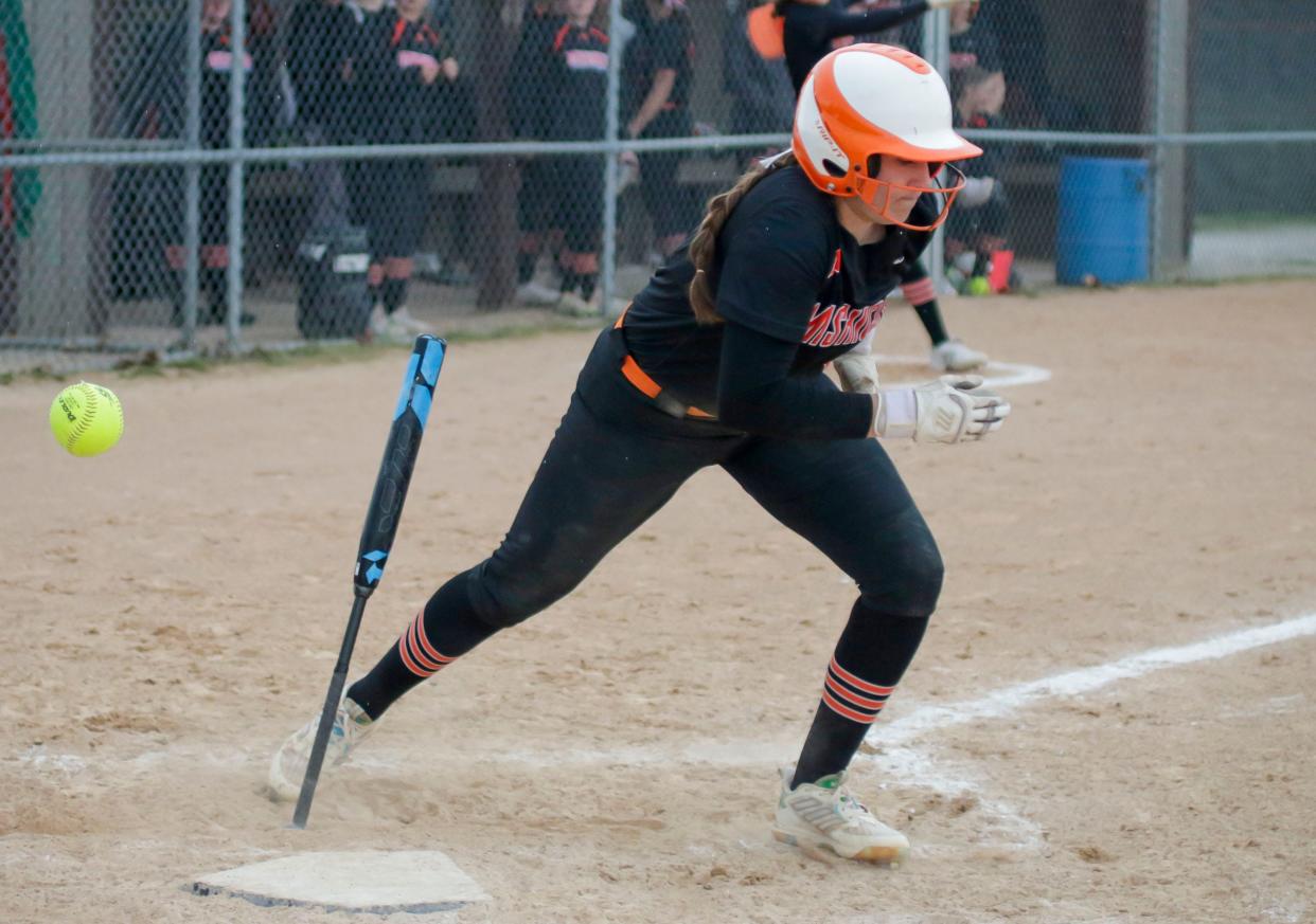 Mishicot’s Katelyn Callahan (14) runs to first base after being walked by a Sevastopol pitch, Tuesday, April 16, 2024, in Mishicot, Wis.