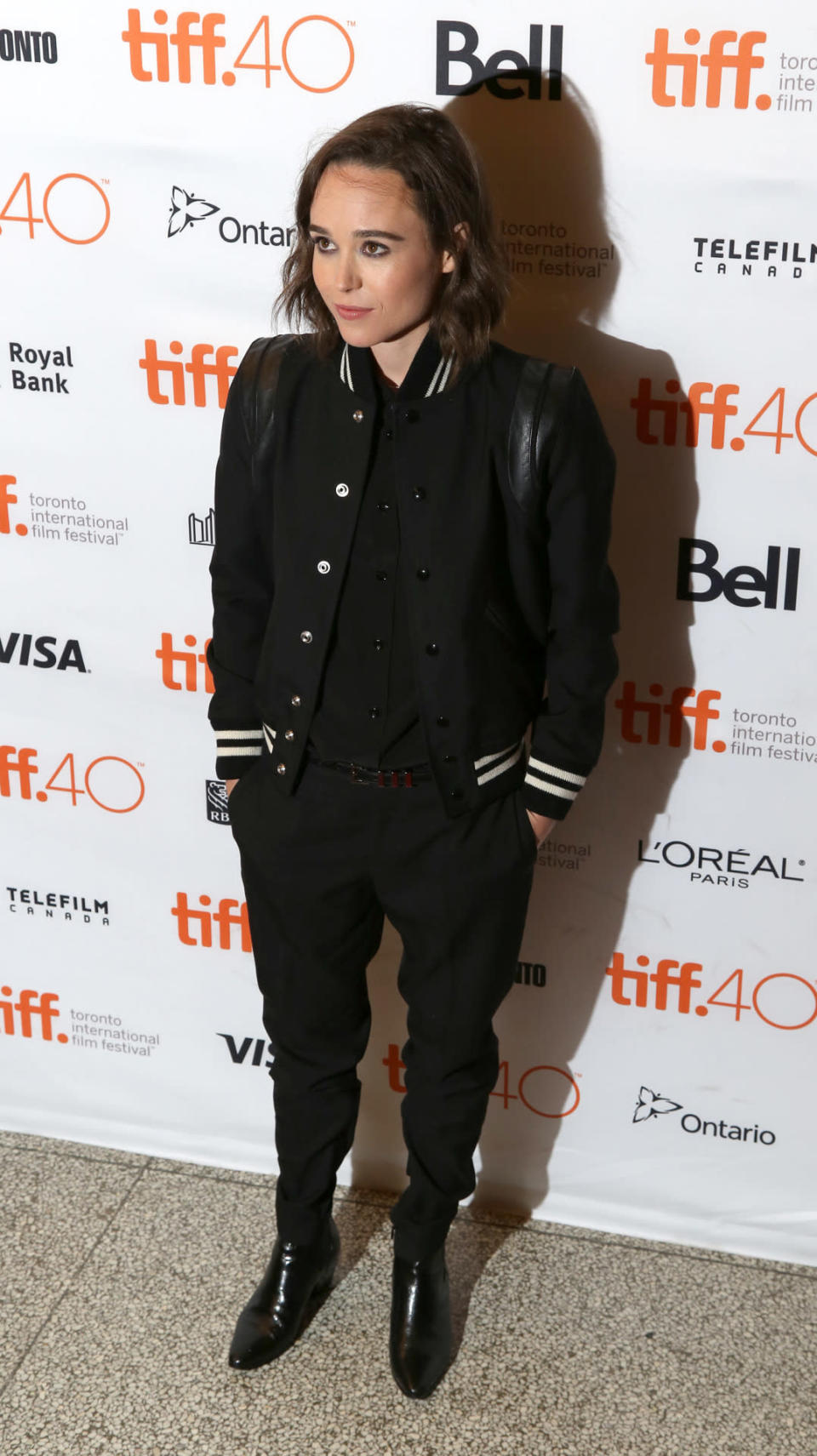 Ellen Page: All black everything (including a must-have varsity jacket) at the “Into The Forest” premiere. 